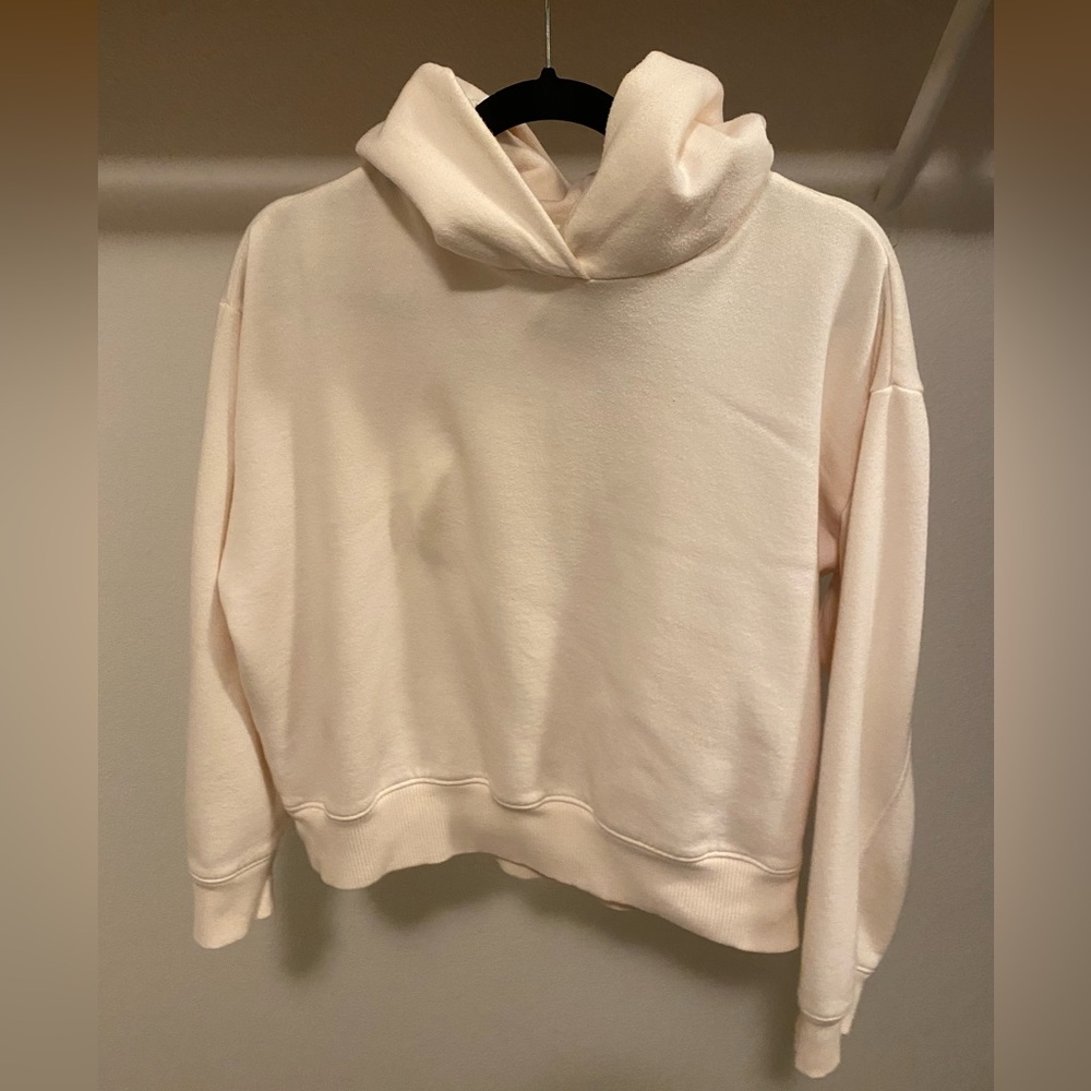 Women’s cream sweatshirt. A new day. Medium.
